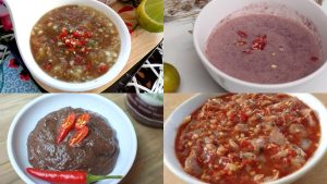 a bowl of food with chopsticks and a bowl of food